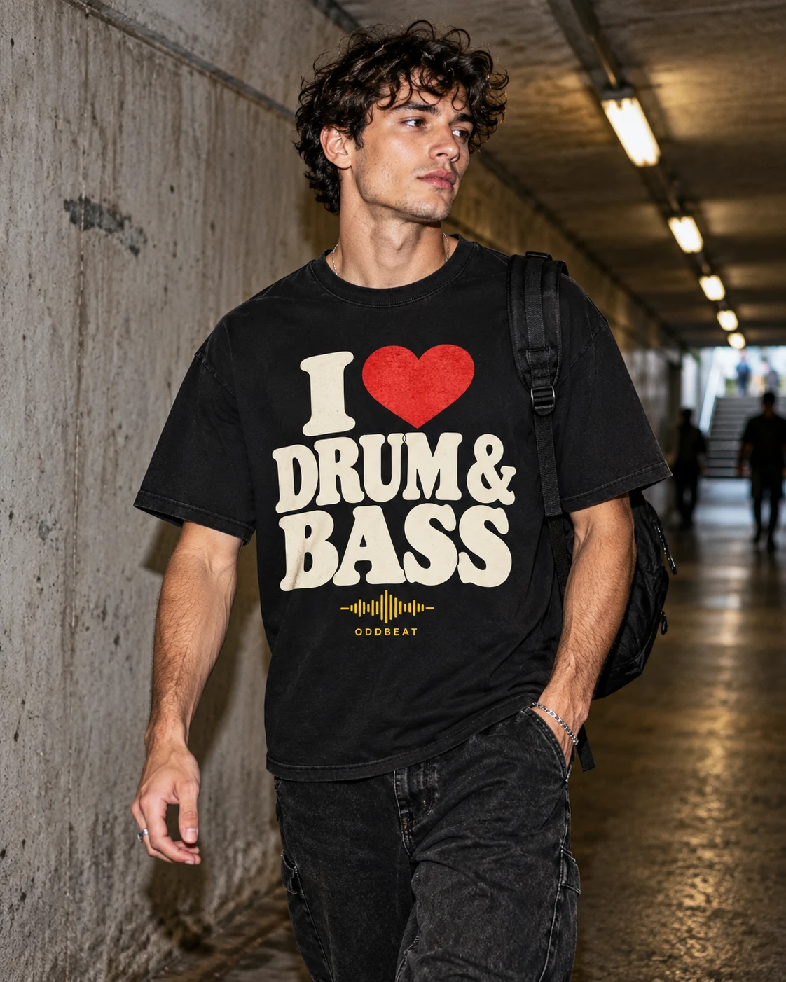 Adult model wearing the I Love Drum and Bass black graphic T-shirt