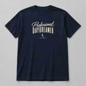Professional Daydreamer Tee in navy with a compact chest print — concept mockup