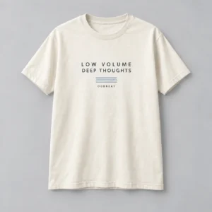 Low Volume Deep Thoughts Tee in cream with a compact chest print — concept mockup