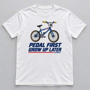 Pedal First Grow Up Later Tee in white with a compact chest print — concept mockup