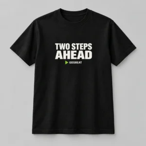 Two Steps Ahead Tee in black with a compact chest print — concept mockup