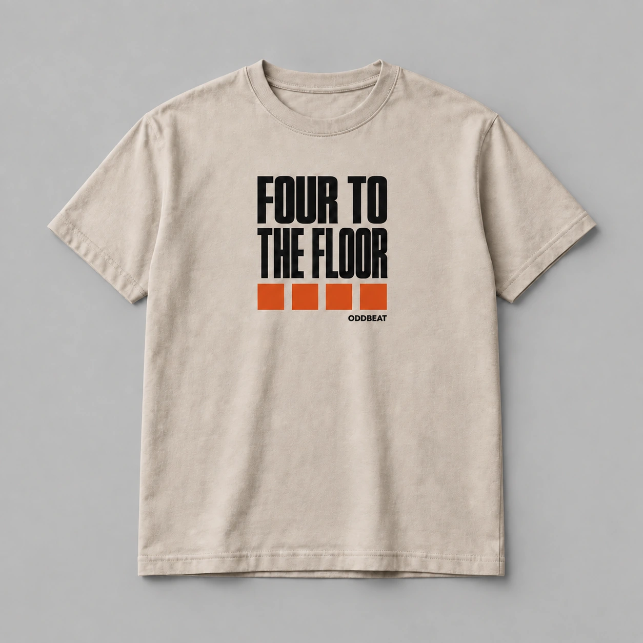 Four To The Floor Tee in stone with a compact chest print — concept mockup