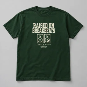 Raised On Breakbeats Tee in forest green with a compact chest print — concept mockup