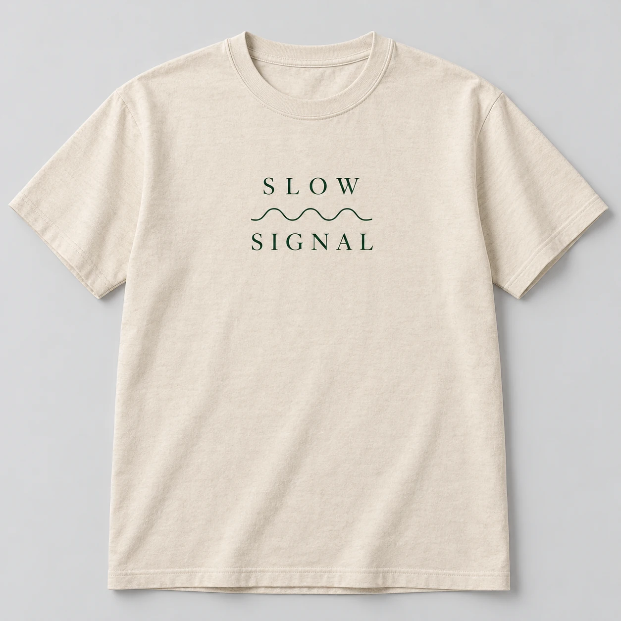 Slow Signal Tee in Oat / Forest — compact graphic concept mockup