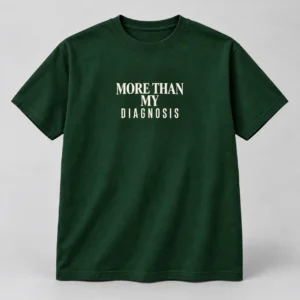 More Than My Diagnosis Tee in Forest / Cream — compact graphic concept mockup