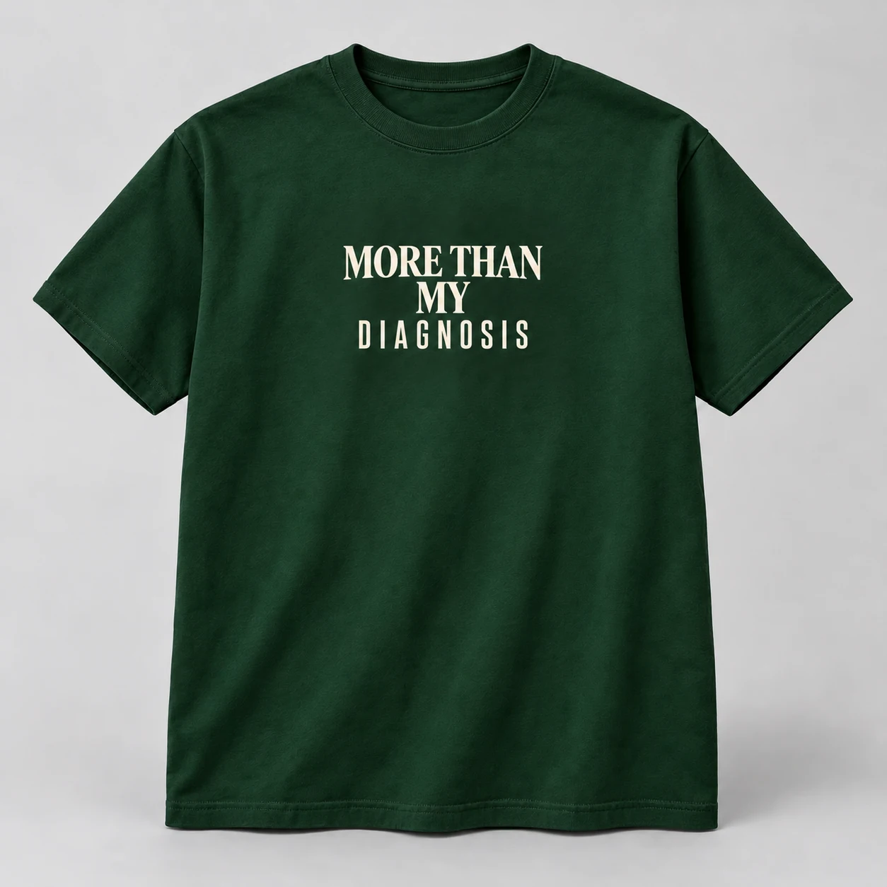 More Than My Diagnosis Tee in Forest / Cream — compact graphic concept mockup