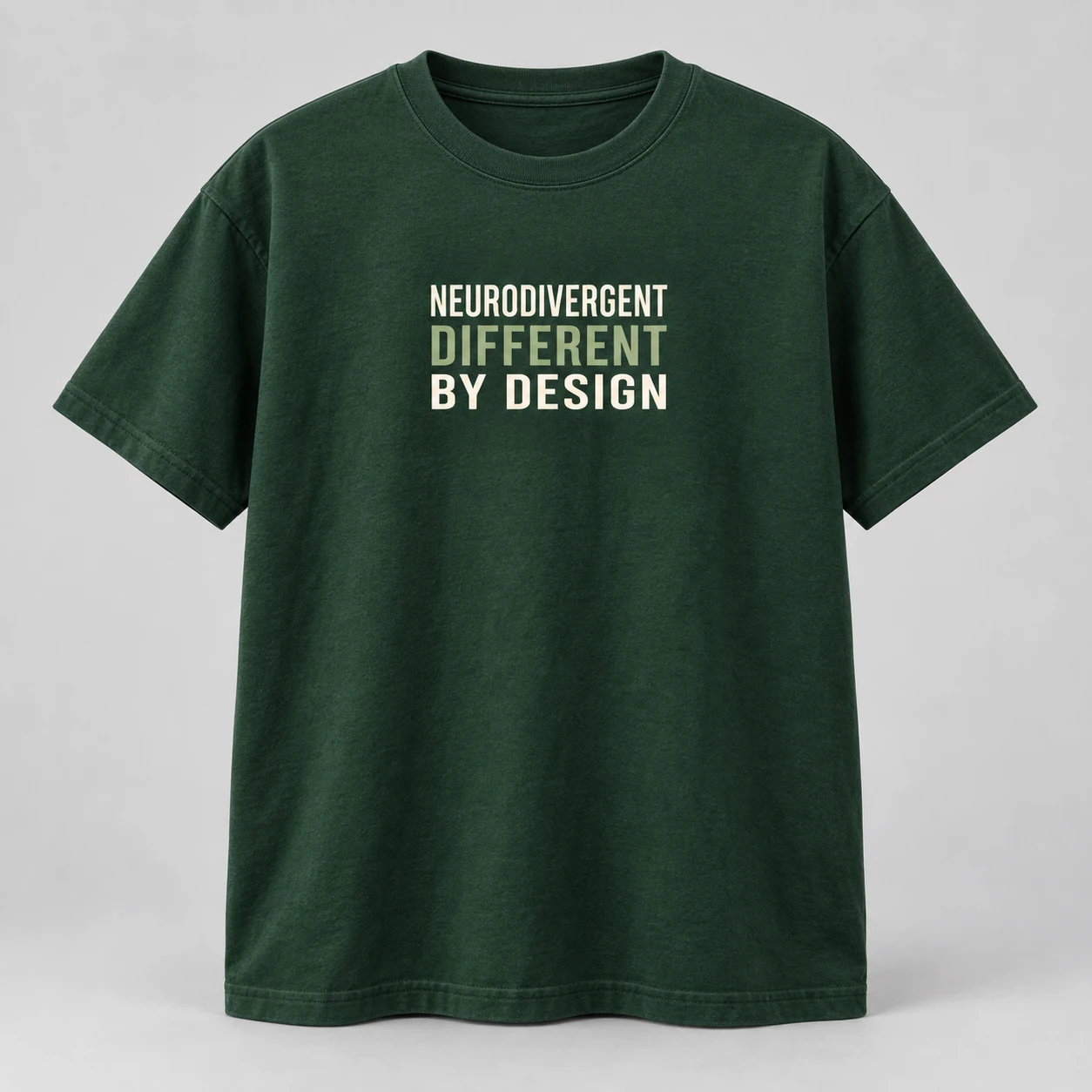 Neurodivergent Different By Design Tee in Forest / Cream — compact graphic concept mockup