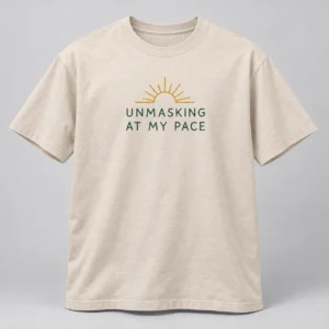 Unmasking At My Pace Tee in Oat / Forest — compact graphic concept mockup