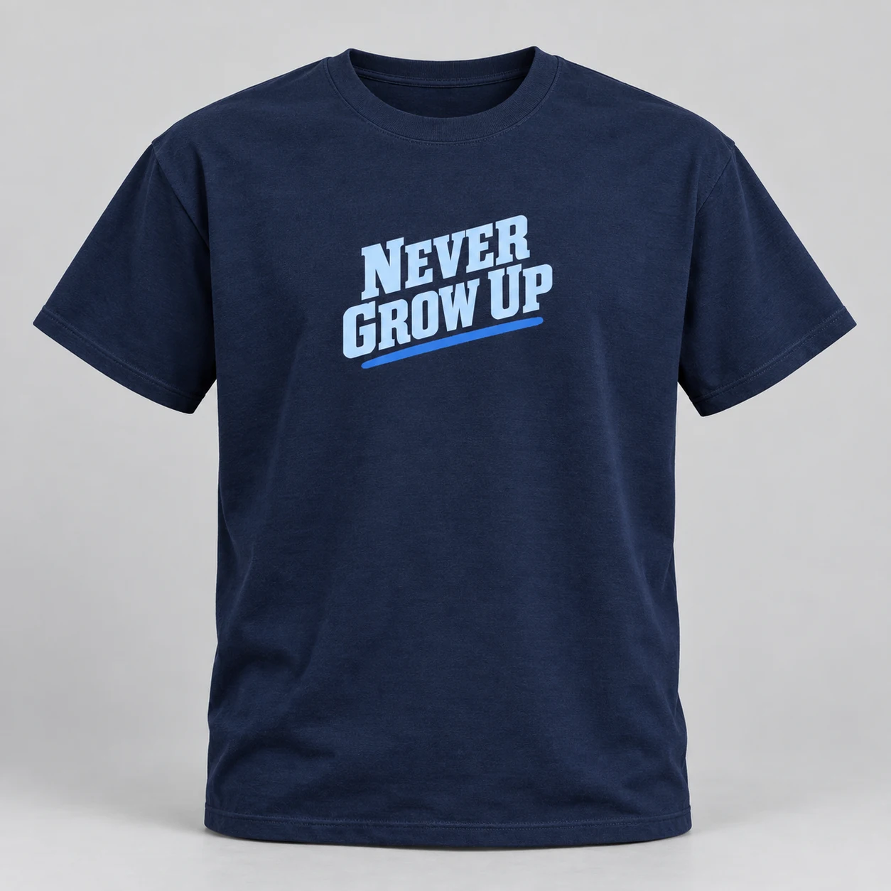 Never Grow Up — Type Edition Tee in Navy / Pale Blue — compact graphic concept mockup