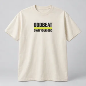 Oddbeat Own Your Odd Tee in Natural / Ink Black — compact graphic concept mockup