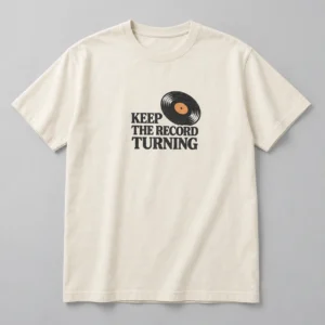Keep The Record Turning Tee in Natural / Ink Black — compact graphic concept mockup