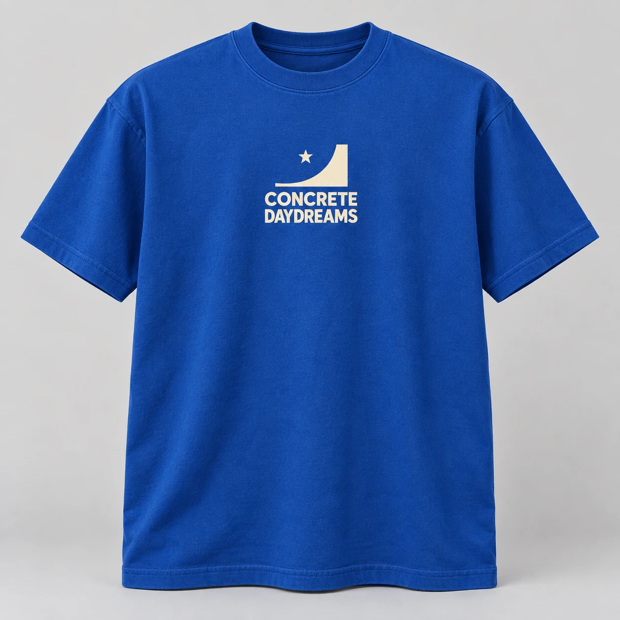 Concrete Daydreams Tee in Cobalt / Cream — compact graphic concept mockup