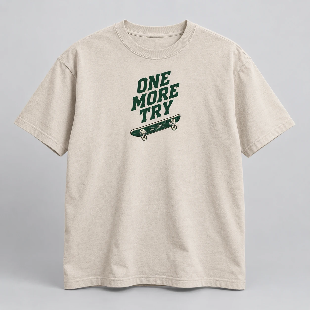 One More Try Tee in Oat / Forest — compact graphic concept mockup