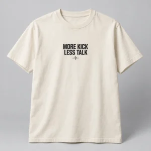 More Kick Less Talk Tee in Natural / Ink Black — compact graphic concept mockup