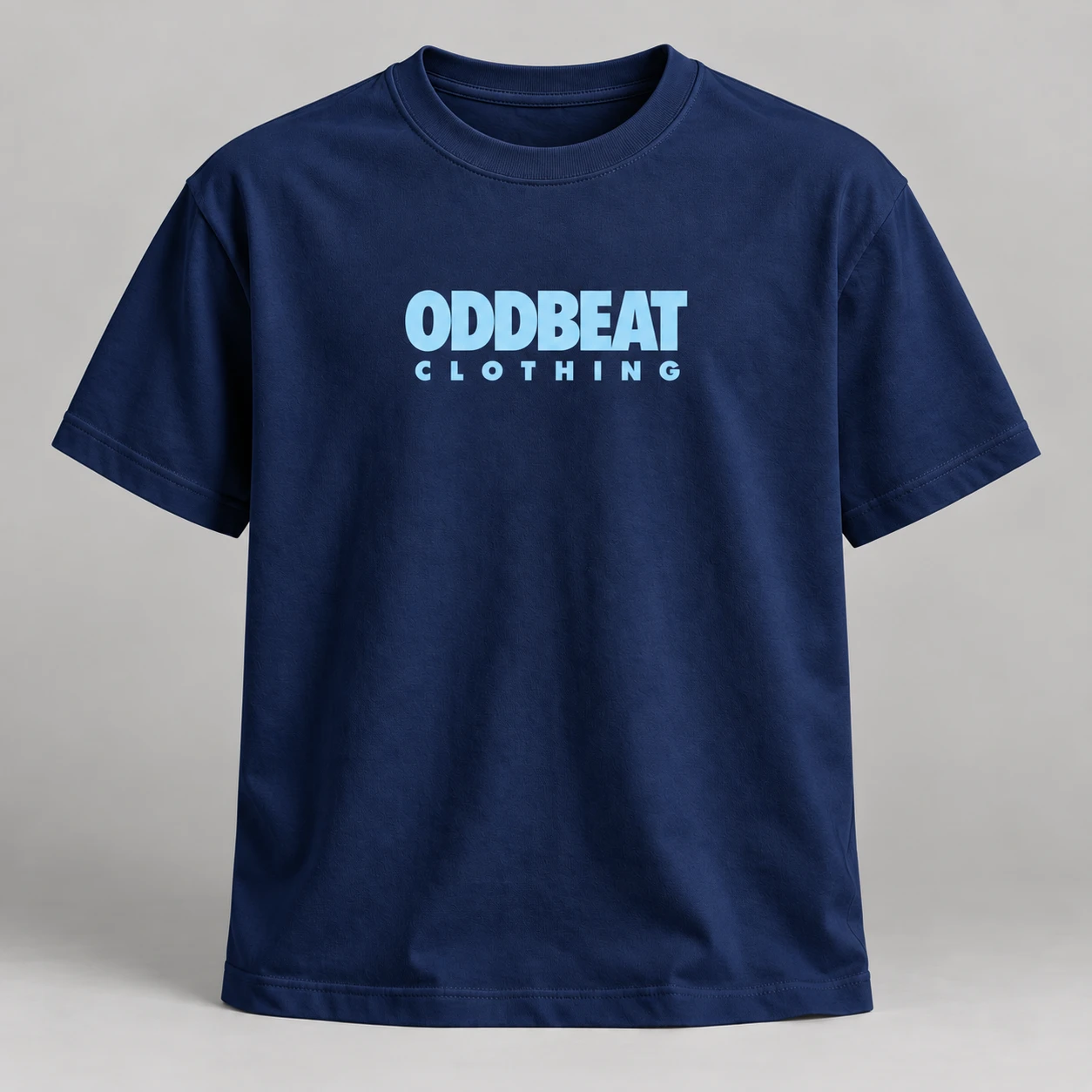 Signature Tee — Navy in Navy / Sky Blue with signature Oddbeat logo — concept mockup
