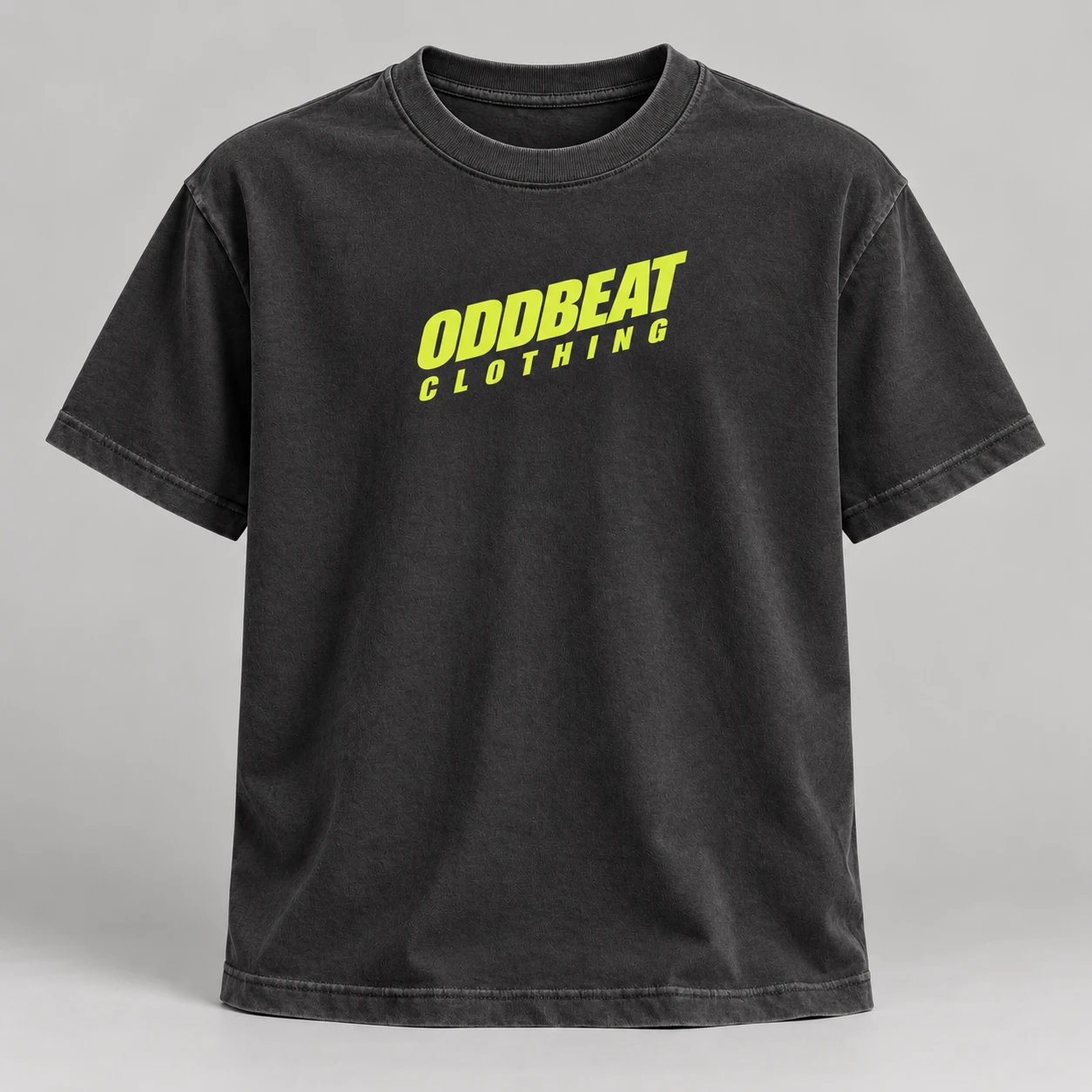 Tilt Tee — Washed Black in Washed Black / Acid Yellow with tilt Oddbeat logo — concept mockup