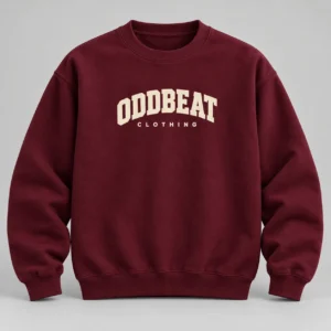 Varsity Sweatshirt — Burgundy in Burgundy / Cream with varsity Oddbeat logo — concept mockup