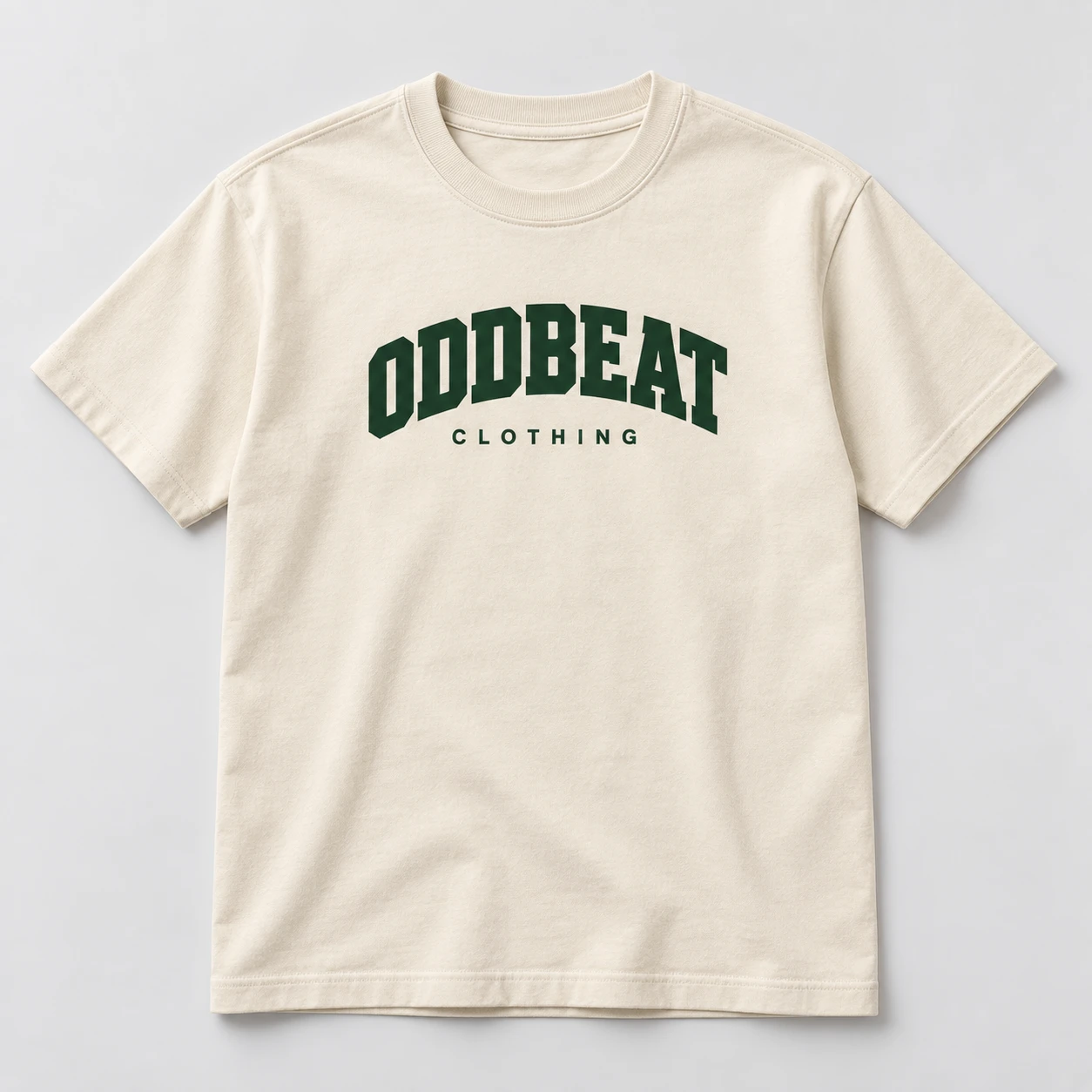 Varsity Tee — Cream in Cream / Forest with varsity Oddbeat logo — concept mockup