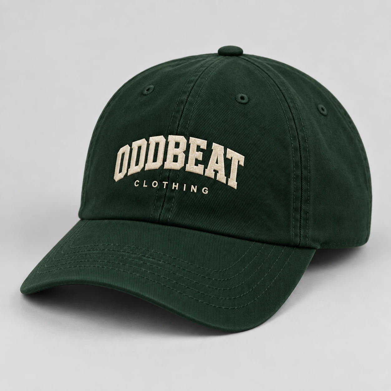 Varsity Cap — Forest in Forest / Cream with varsity Oddbeat logo — concept mockup